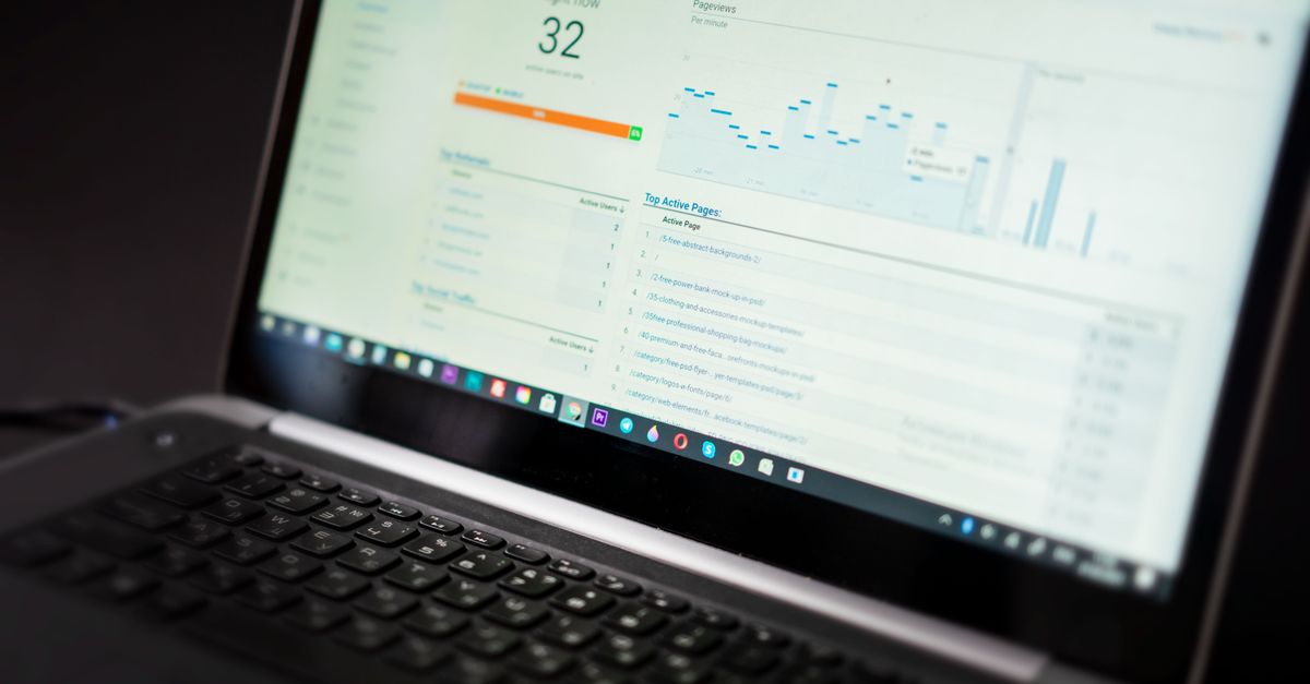 Analytics dashboard with charts displayed on a laptop screen