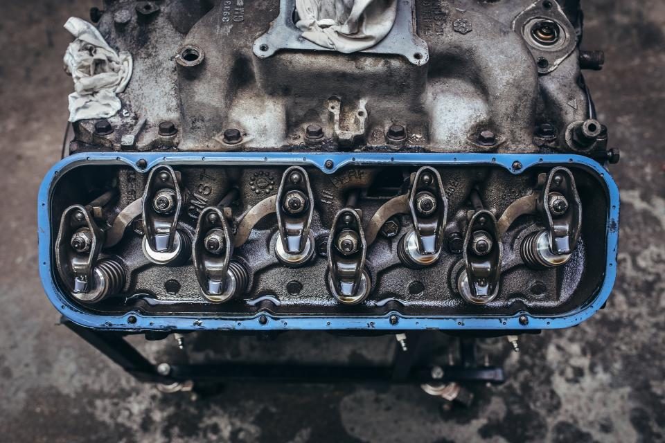 Engine cylinder head with valves and rocker arms
